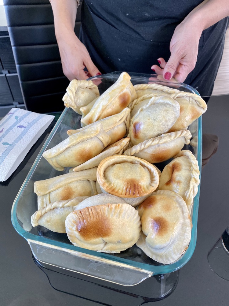 Making empanadas de pino (empanadas with beef filling)