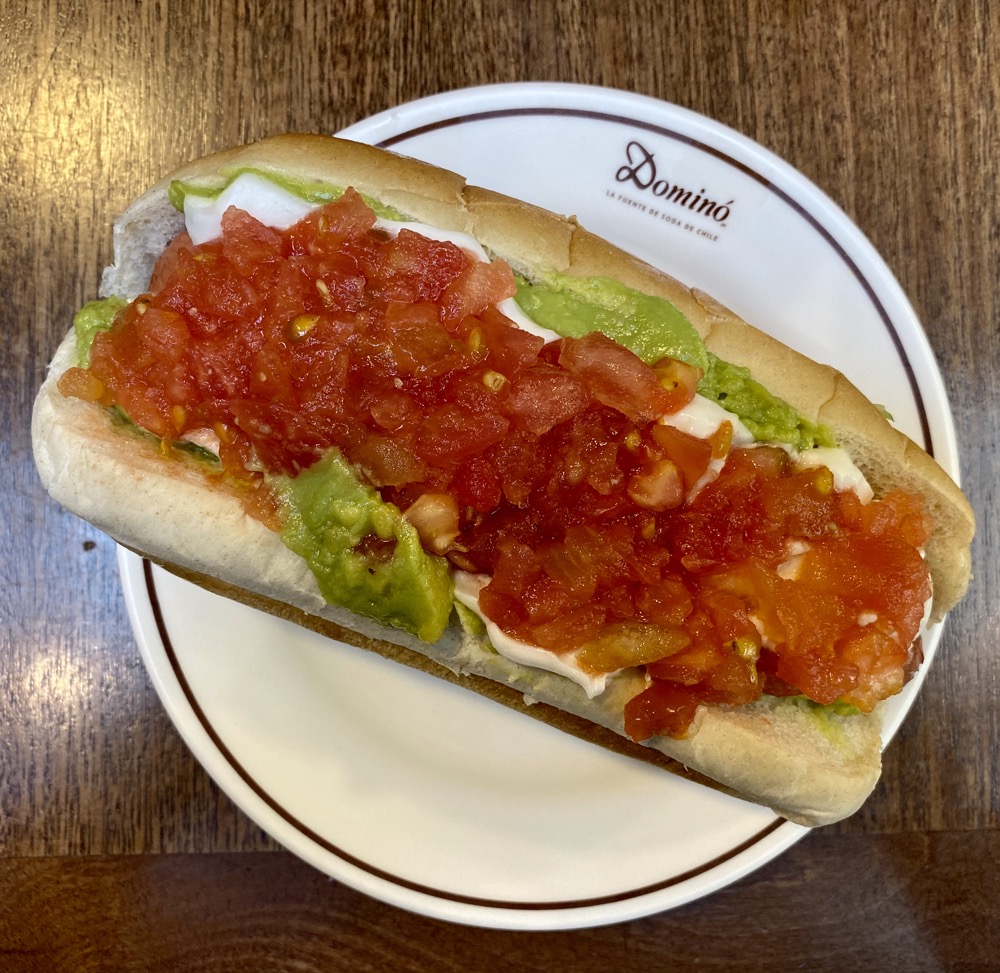 A 'completo Italiano' - named after the colors of the Italian flag. Has absolutely nothing to do with Italian foods or flavors. There's a hot dog hiding under there