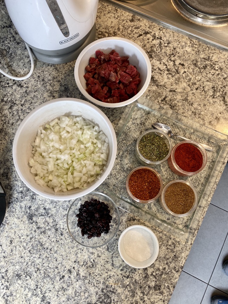 Making empanadas de pino (empanadas with beef filling)